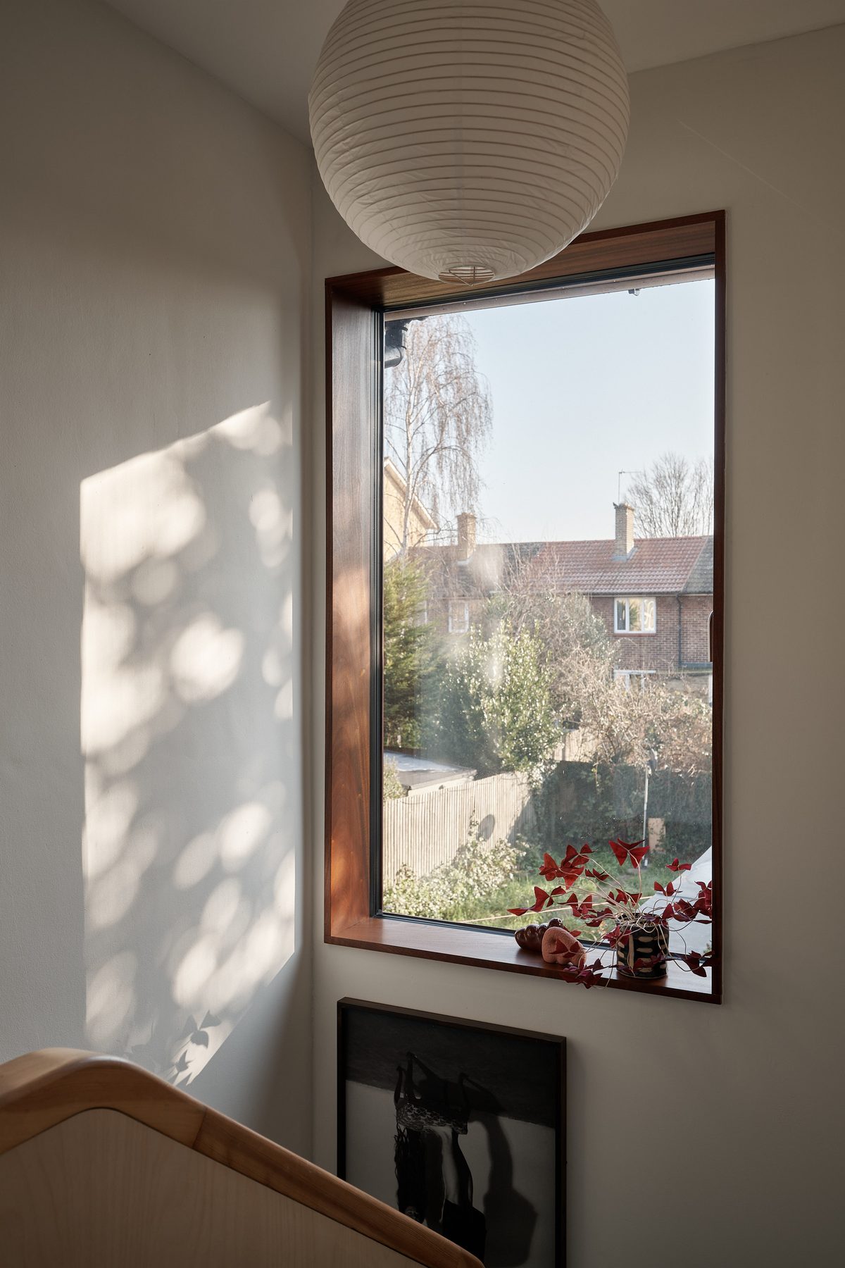 Staircase and window with a paper lantern