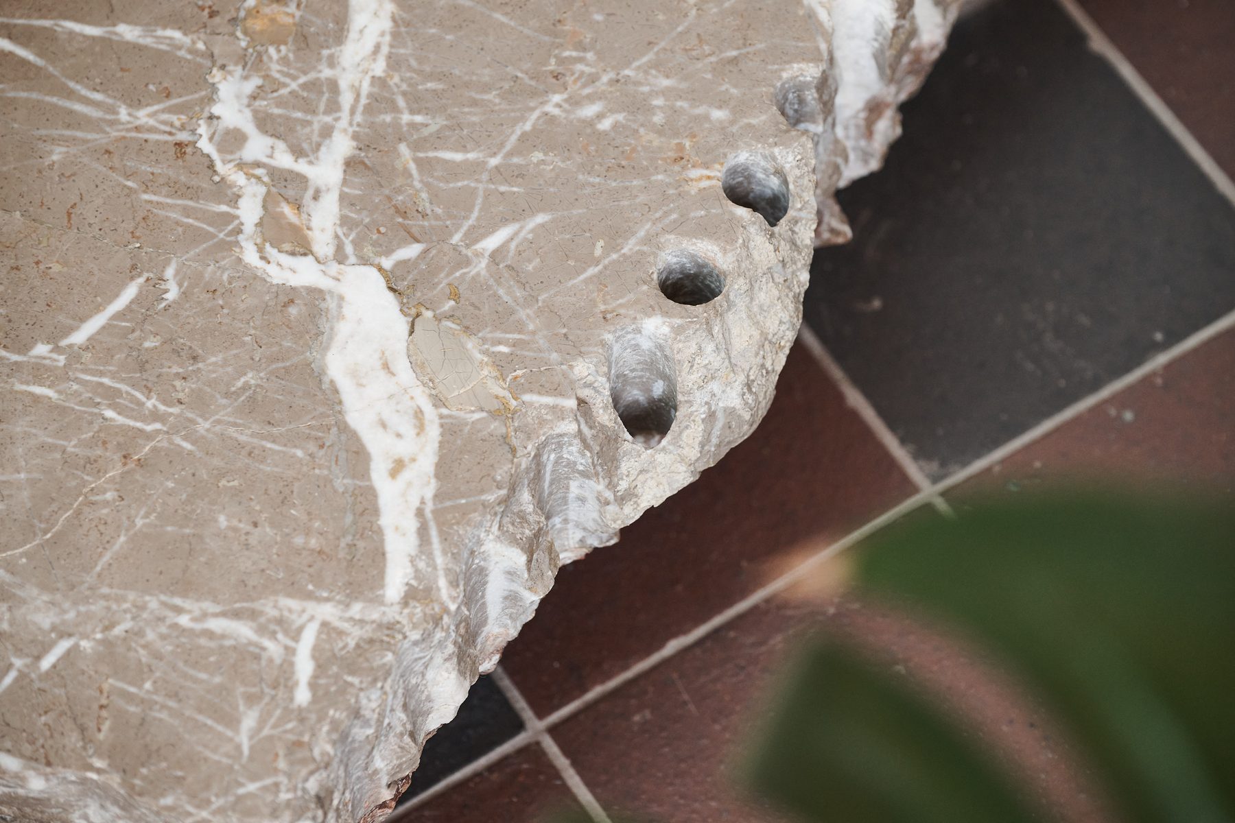 Marble threshold detail set with pebbles