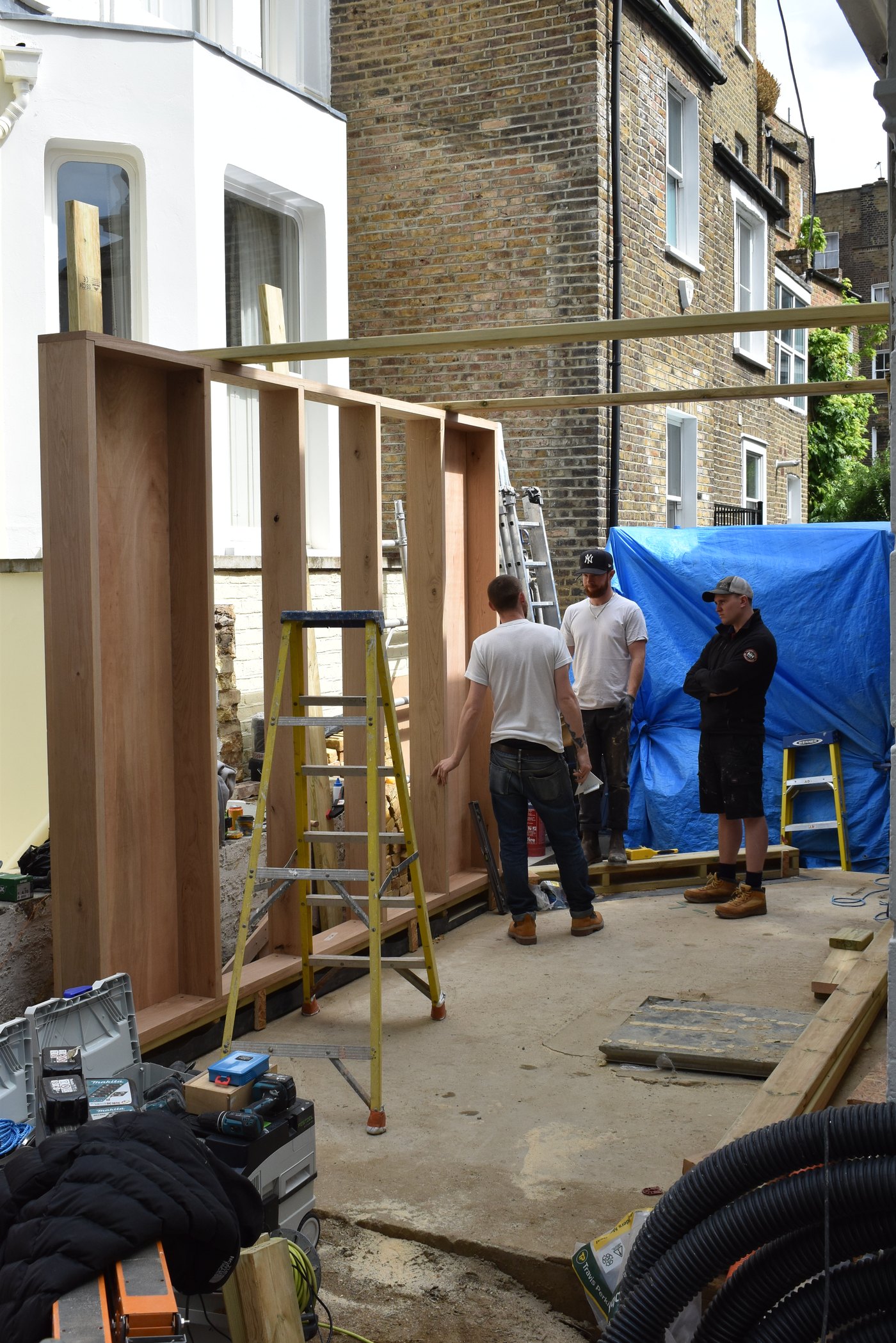 Building a tall oak-framed partition on site