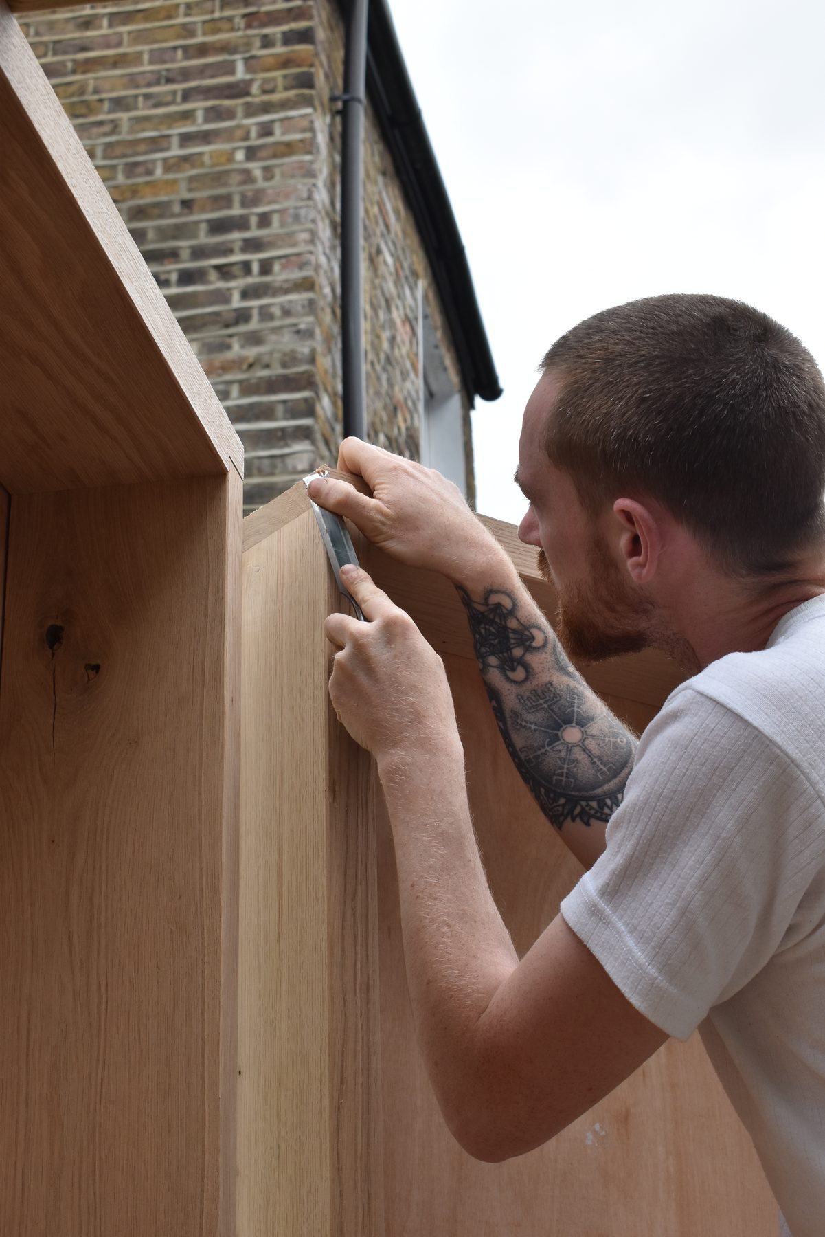 Chiselling an oak joinery detail on site