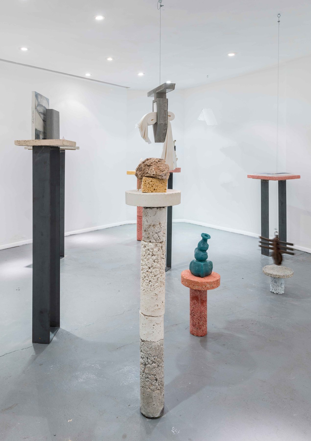 Concrete and stone plinths in a gallery installation